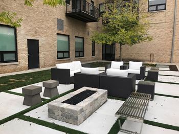 Landscaped courtyard with fire pit